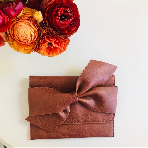 Anthropologie Handbags - Anthropologie Bella Bow Clutch
